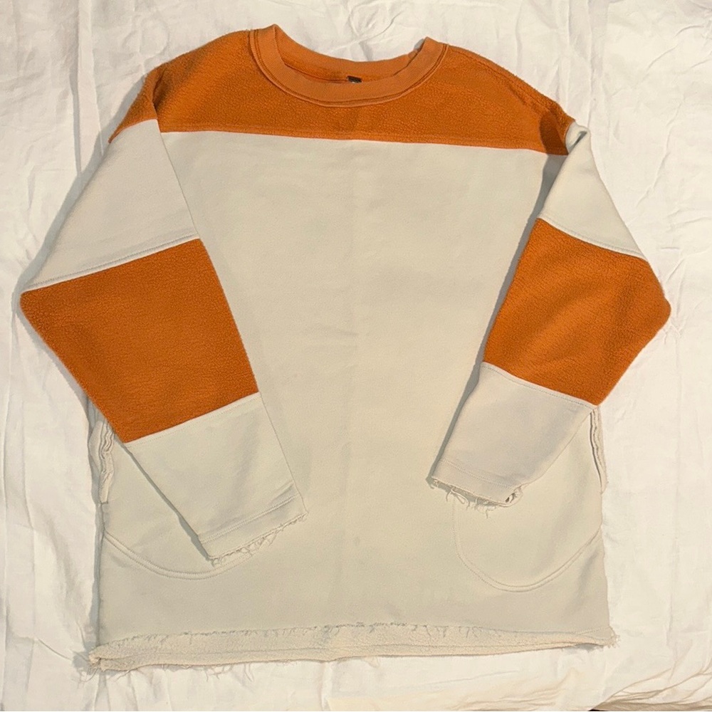 Free People, women’s XS (oversize fit), orange & off white sweatshirt w pockets.